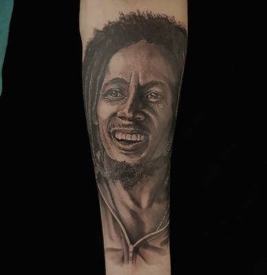 Izhar Rott Tattoo of Bob Marley
