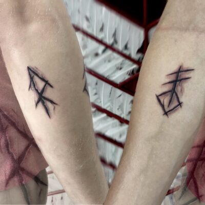 arm tattoo, runes, light art tattoo, women tattooer