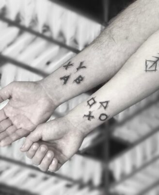 arm tattoo, sleeve tattoo, light art tattoo, gaming tattoo, nintendo tattoo
